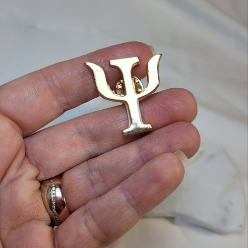 Altın psikoloji sembolu rozet